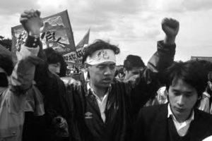 a group of young people protesting