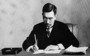 Emperor Hirohito signing the Constitution of Japan,
