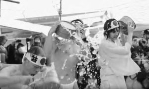 Image of people pouring water on themselves during the ceremony