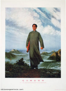 image of a man in robes standing among a beautiful backdrop