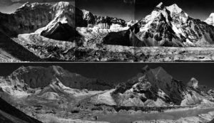 Photograph of the Imja glacier. Mountaintops visible over landscape.