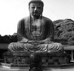 photo of a meditating buddha