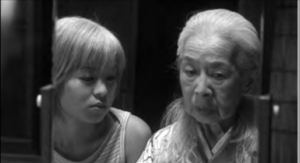 Screenshot of a girl and a old woman