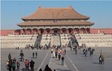 photo of a large building with pointed roofs