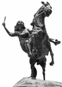 Gabriela Silang Monument on Ayala Avenue, Manila.  Statue is of a man brandishing a knife while on horseback. 