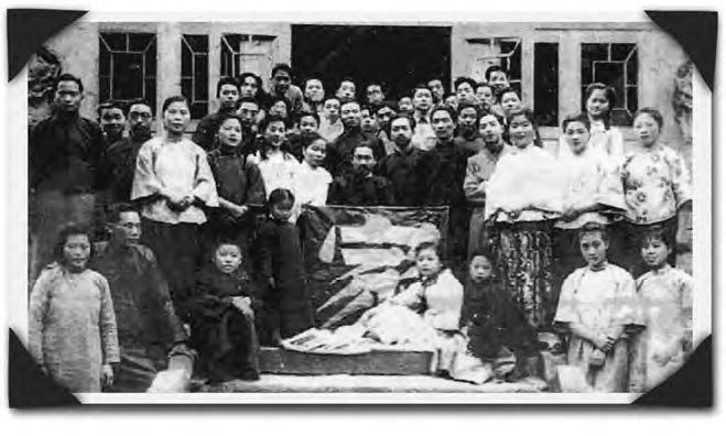 Group picture of the drama troupe at the war campus of Xiamen University at Zhangting. The author is circled in the upper right, back row.