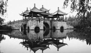 A long bank planted with weeping willows spans the lake; at its midpoint stands a square terrace with pavilions at each of the corners and one in the center. Around the lake is a park in which are found several attractions: Lotus Flower Pagoda (Lianhua SO, a white structure reminiscent of the White Pagoda (Baita) in Beijing's Beihai Park; Small Gold Mountain (Xiao Jin Shan); and the Fishing Platform (Diaoyutai), a favorite retreat of the Qianlong Emperor. The emperor was so gratified by his luck in fishing at this spot that he ordered additional stipends for the town. As it turns out, his success had been augmented by local swimmers who lurked in the lake busily attaching fish to his hook.