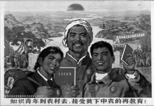Image shows three people holding the book of Mao with the river behind them.