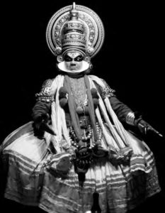 a photo of a performer in an elaborate costume