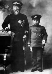 a man and child in military uniform