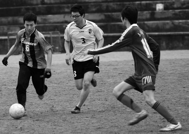 Koreans playing soccer.