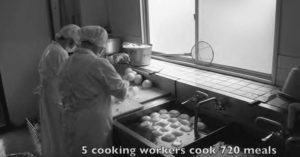 two people cooking