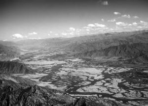 Aerial view of the verdant Brahmaputra river landscape. 