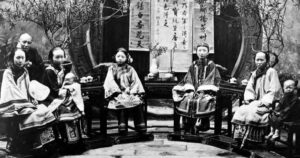 photo of a chinese family sitting together 