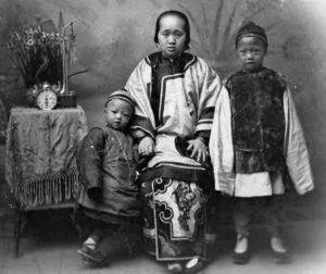 photo of a family, a woman and her two sons