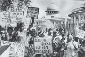 Image shows people doing Mathura Rape Case protest front of building