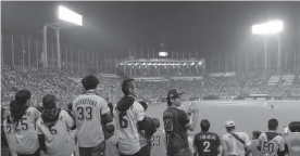 photo of people in the stands at a soccer game