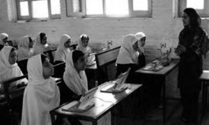 young women sitting at desks