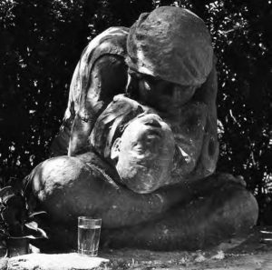 Sculpture of a woman sitting and crying while holding a child who seems to be dead. This was an artistic depiction of the impacts of minamata disease.