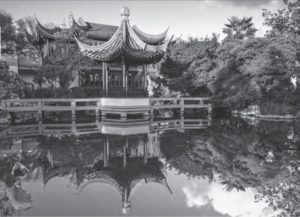 Moon-Locking Pavilion in the Lan Su Garden. The pavilion is situated on the open pond where water lilies float. 