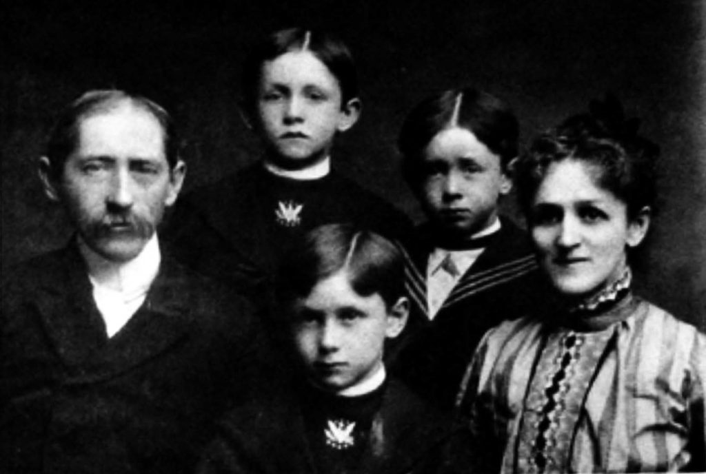 A family portrait of Samuel Forman Moore with his wife and three young sons.