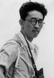 a photo of a man with glasses