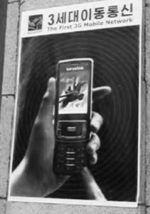 A North Korean flyer that states that the first 3G network is available. The flyer image shows a  person holding up a flip phone. 