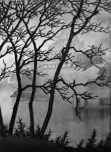 photo of a painting of tree branches obscuring a view of a castle in fog