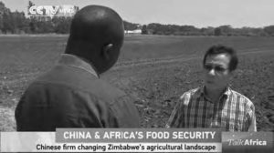 Screen capture of two men are talking on the fields