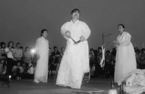 photo of several women in white robes