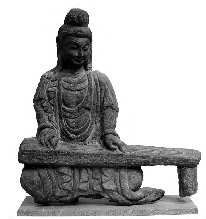 Rock carving of a bodhisattva playing a guqin