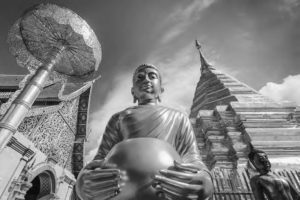 Wat Prathat Doi Suthep Temple. Built in the early 19th Buddhist century, the beauty of Wat Phra That Doi Suthep is marked by seven-headed serpent statues that line the stairs to the temple where a Chiang Saen style golden pagoda and all its exquisite Lanna architecture is situated.