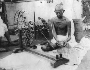 Image of Gandhi spinning 