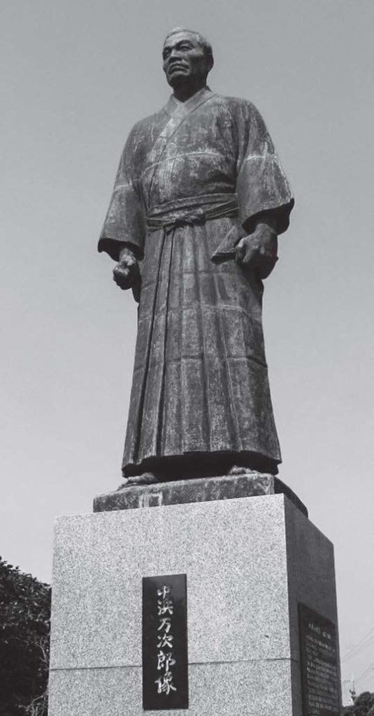 statue of a man in robes