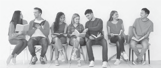 photo of a group of students with books