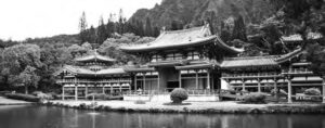 photo of a large Japanese pagoda with angled roofs with pointed ends