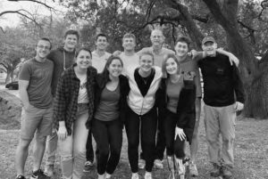 a group of young people smile for the photo