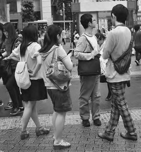 photo of a group of young people talking to each other