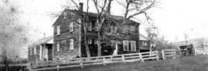 photograph of an old and beaten house