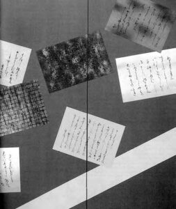 an image of several pieces of paper with calligraphy