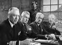 several men in military uniforms sit at a table