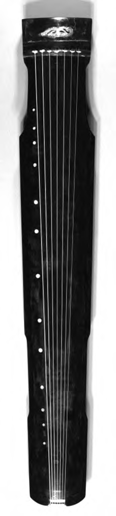 photo of a qin (long string instrument)