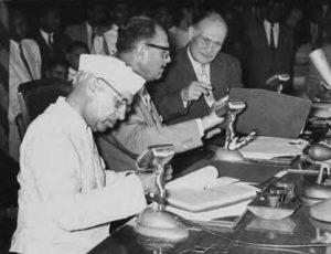 Image shows Indian Prime Minister Jawaharlal Nehru and Pakistan President Ayub Khan are signing documents