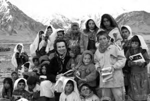 photo of a man with a group of children