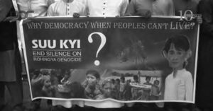 banner for suu kyi to end silence on rohingya genocide