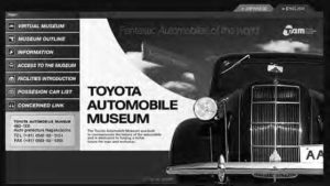 An ad for Toyota Automobile Museum, with the front bumper of an old car visible. 