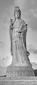 tall statue of a woman in robes