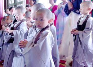 Korean children attending Buddhist ceremony.